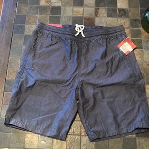 New Mens size S, 10” shorts blue color that tie in the front.
